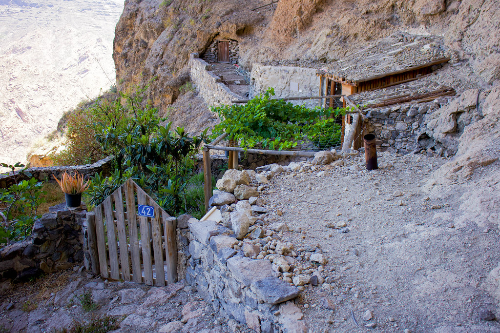 Cave homes and stone structures at Acusa Seca in Artenara